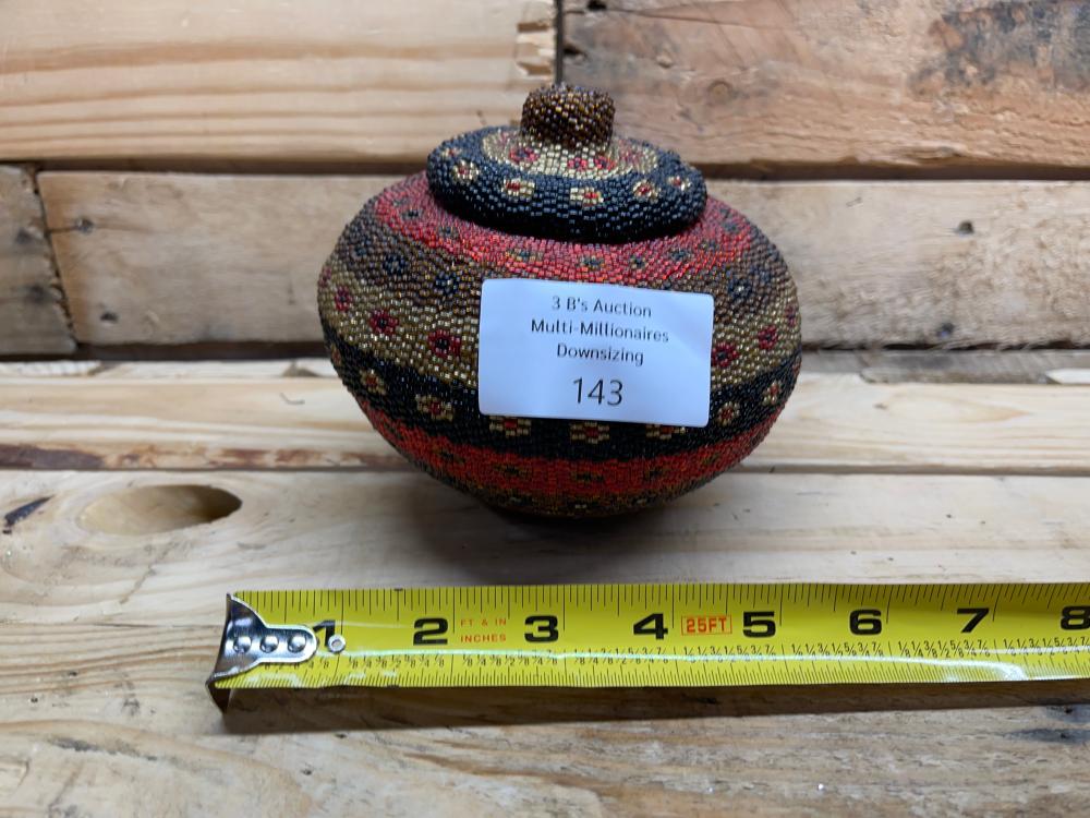 hand made beaded wicker jar with lid