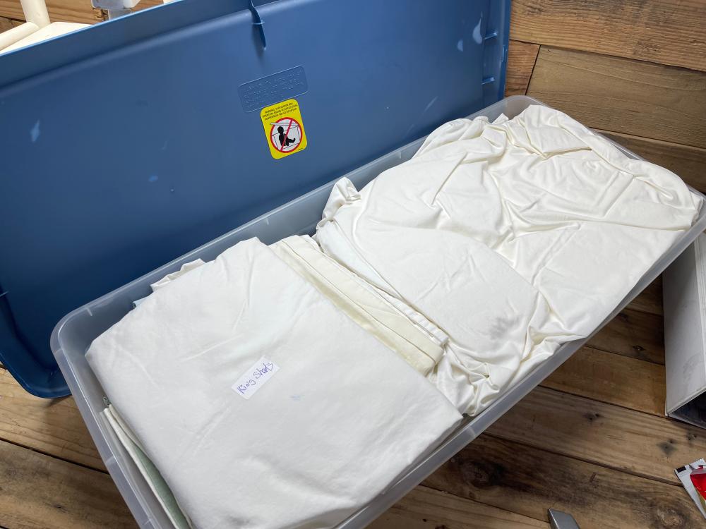 Tote of Pillow cases and Sheets
