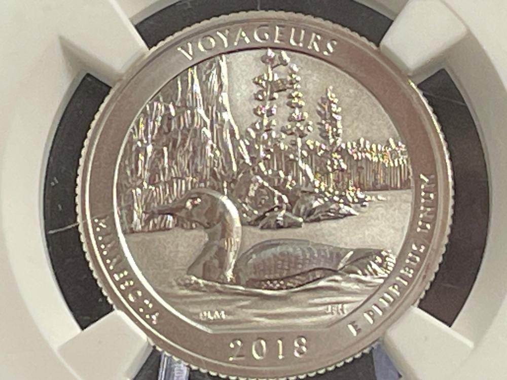 NGC GRADED PF69 REVERSE PROOF SILVER 2018 VOYAGEURS QUARTER