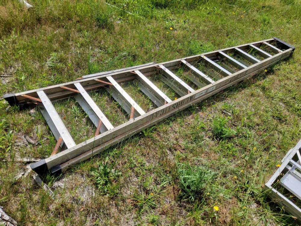 large ladder 12ft bottom step is 27" wide has a wood support bracket on one side, as always ladders are sold as is