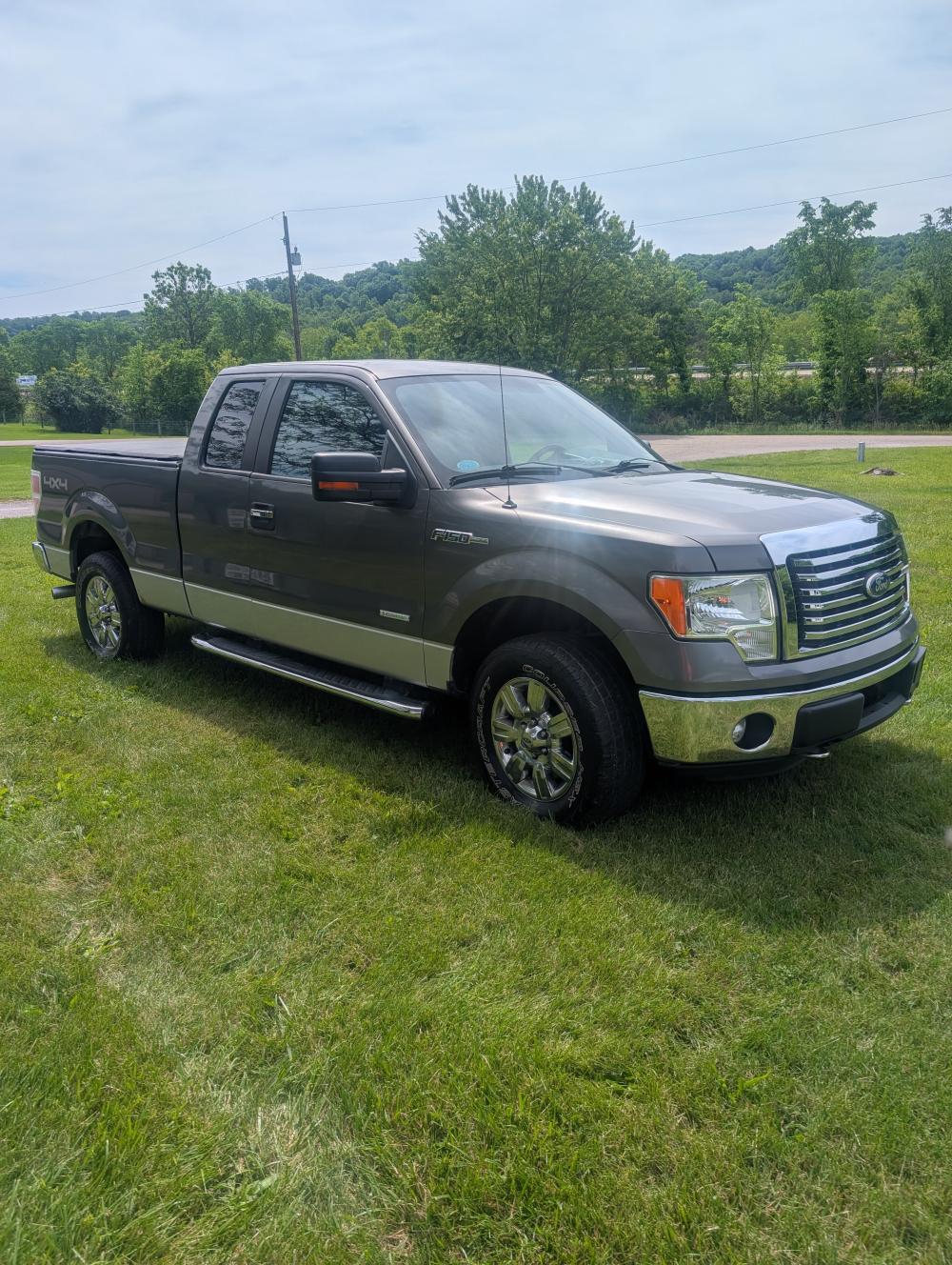 2011 F-150 XLT with title - 4x4 - eco boost- runs great - good a/c and heat - towing package- minor rust and age dings - nice interior - 2 keys - 95,855 miles - vin # 1FTFX1ET2BFB53493 - Ford tough/ready for new owner