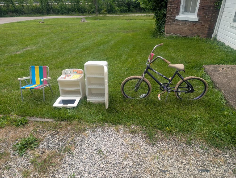 kids' bike, plastic toy kitchen, youth lawn chair