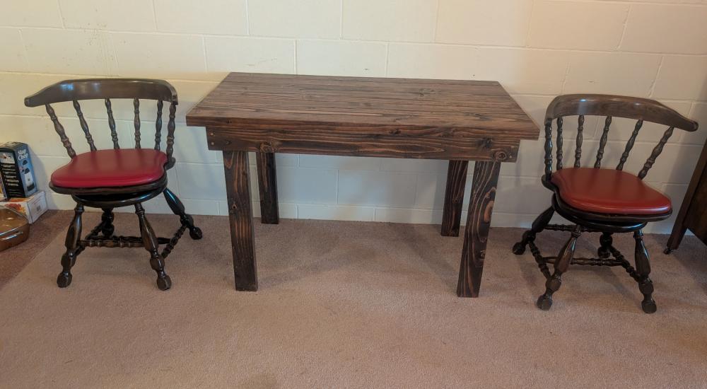 wood table with 2 swivel ch... image