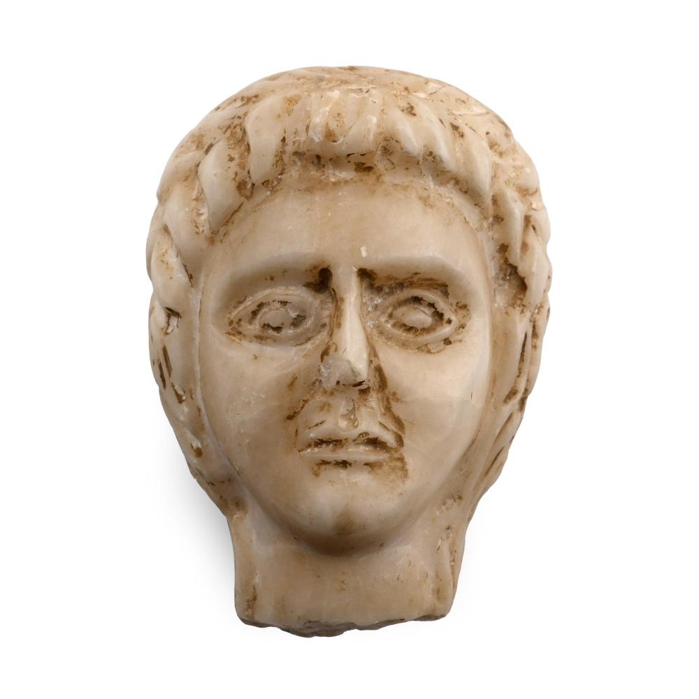Antique carved marble head of Roman patrician