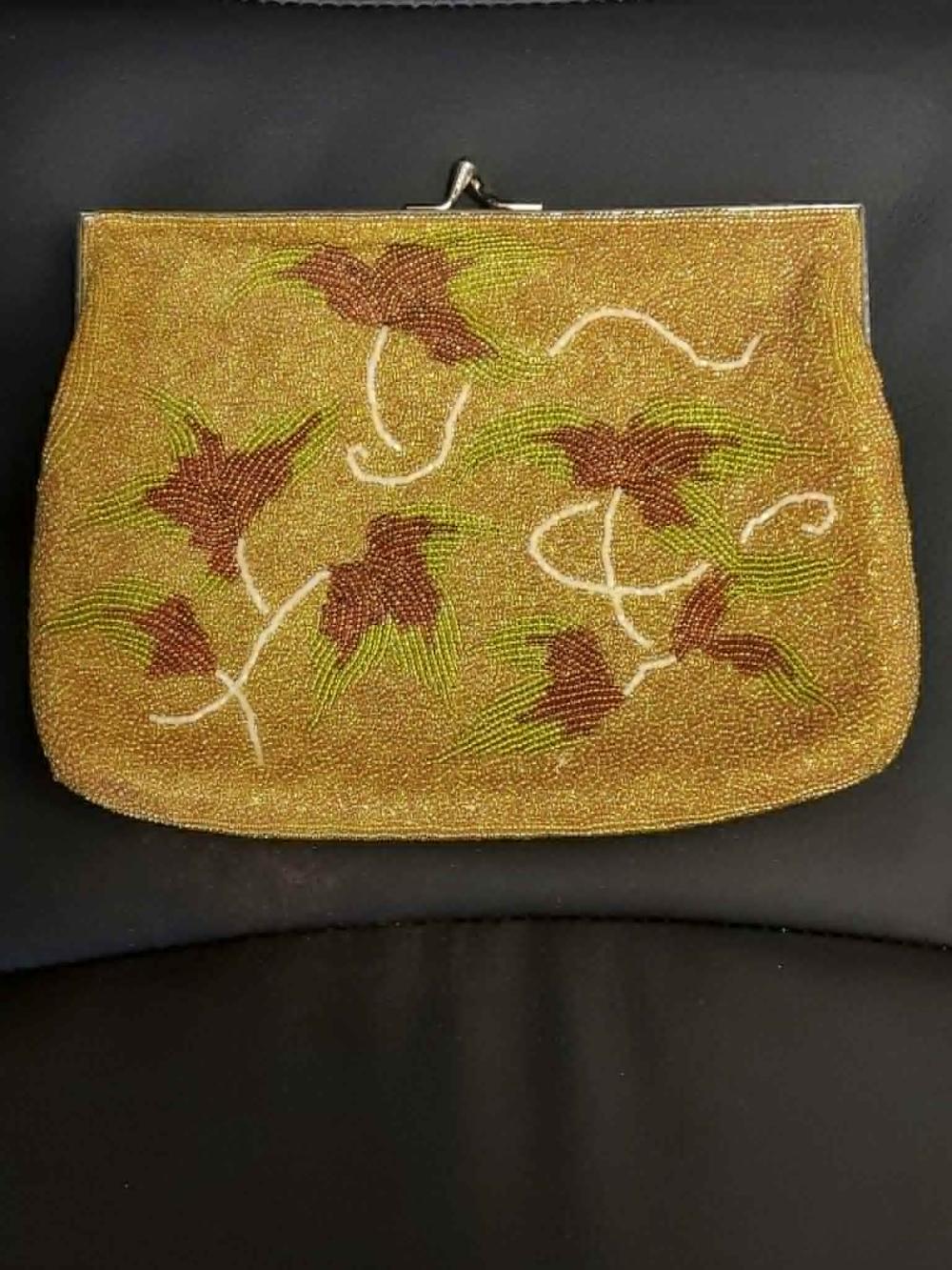 Leaf motif clutch purse image
