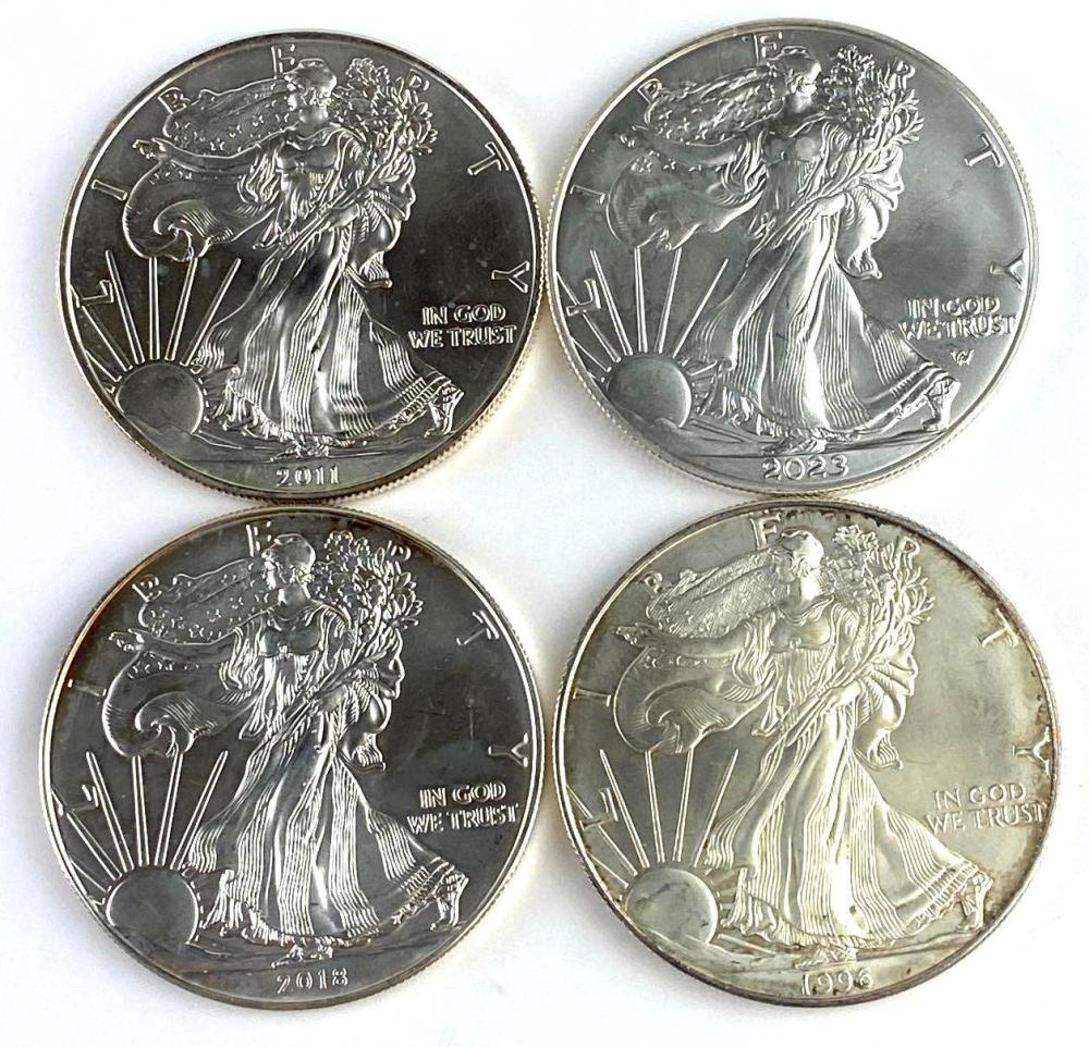 Group of 4 US 1 Oz American Silver Eagles