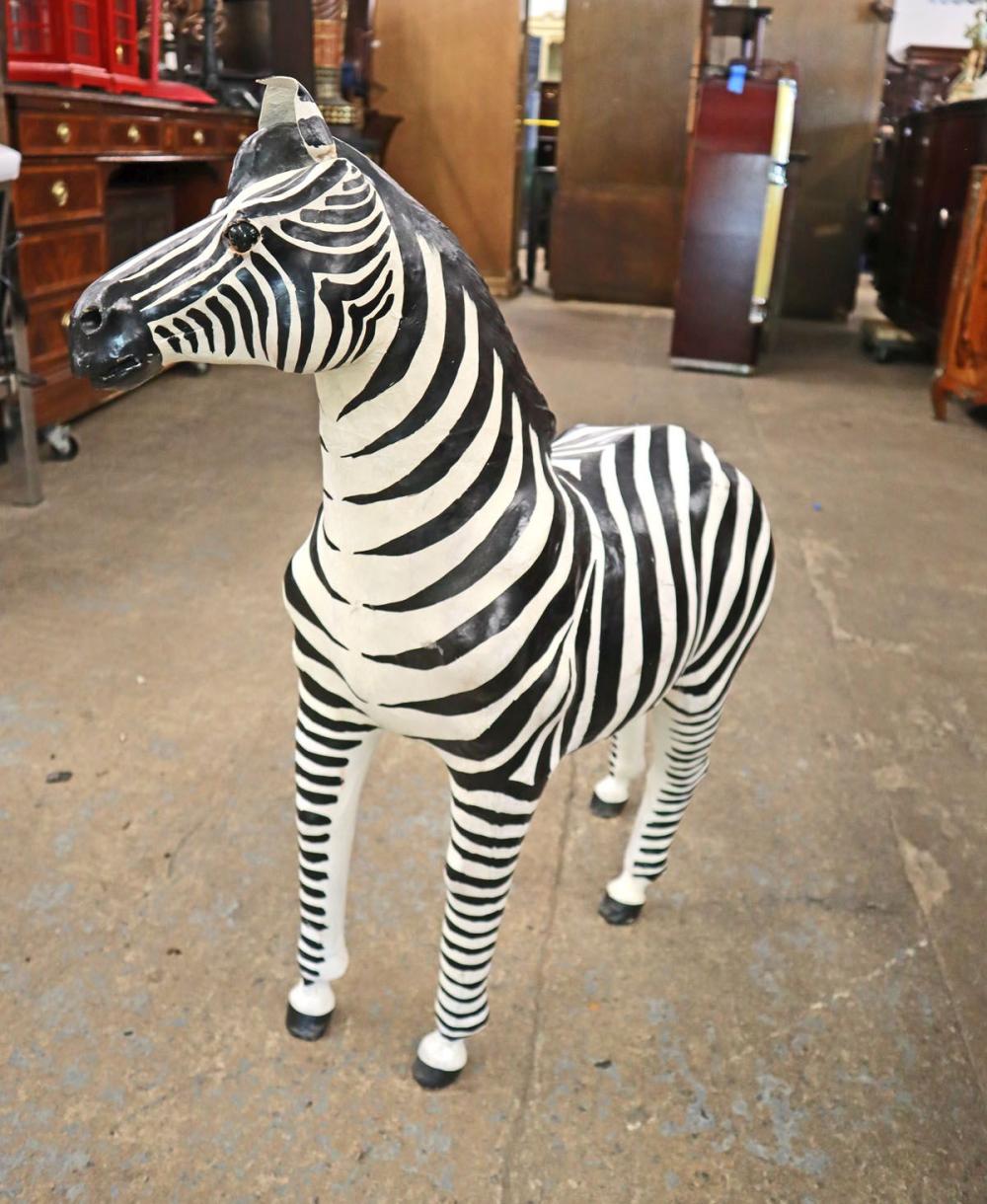 Wooden zebra with leather ears