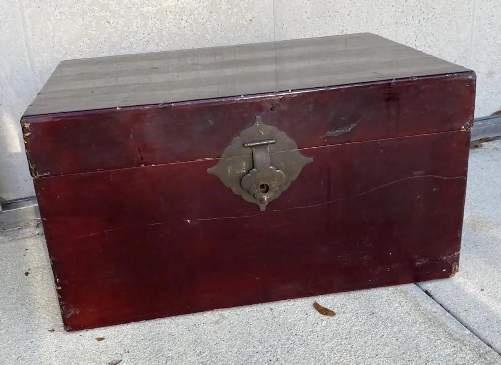CHINESE RED LACQUERED VELLUM TRUNK