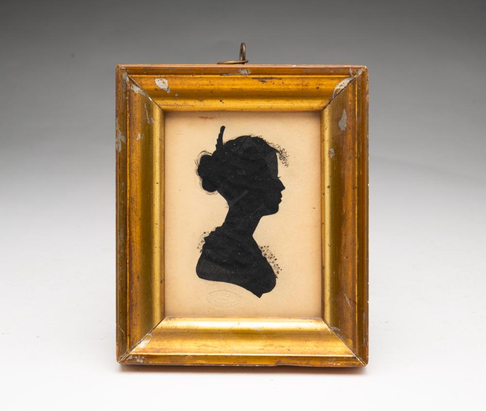 WILLIAM BACHE (ENGLISH, 1771-1845; LIVED AND WORKED IN THE U.S.) PATENT HOLLOW-CUT AND INK SILHOUETTE PORTRAIT OF A YOUNG LADY.