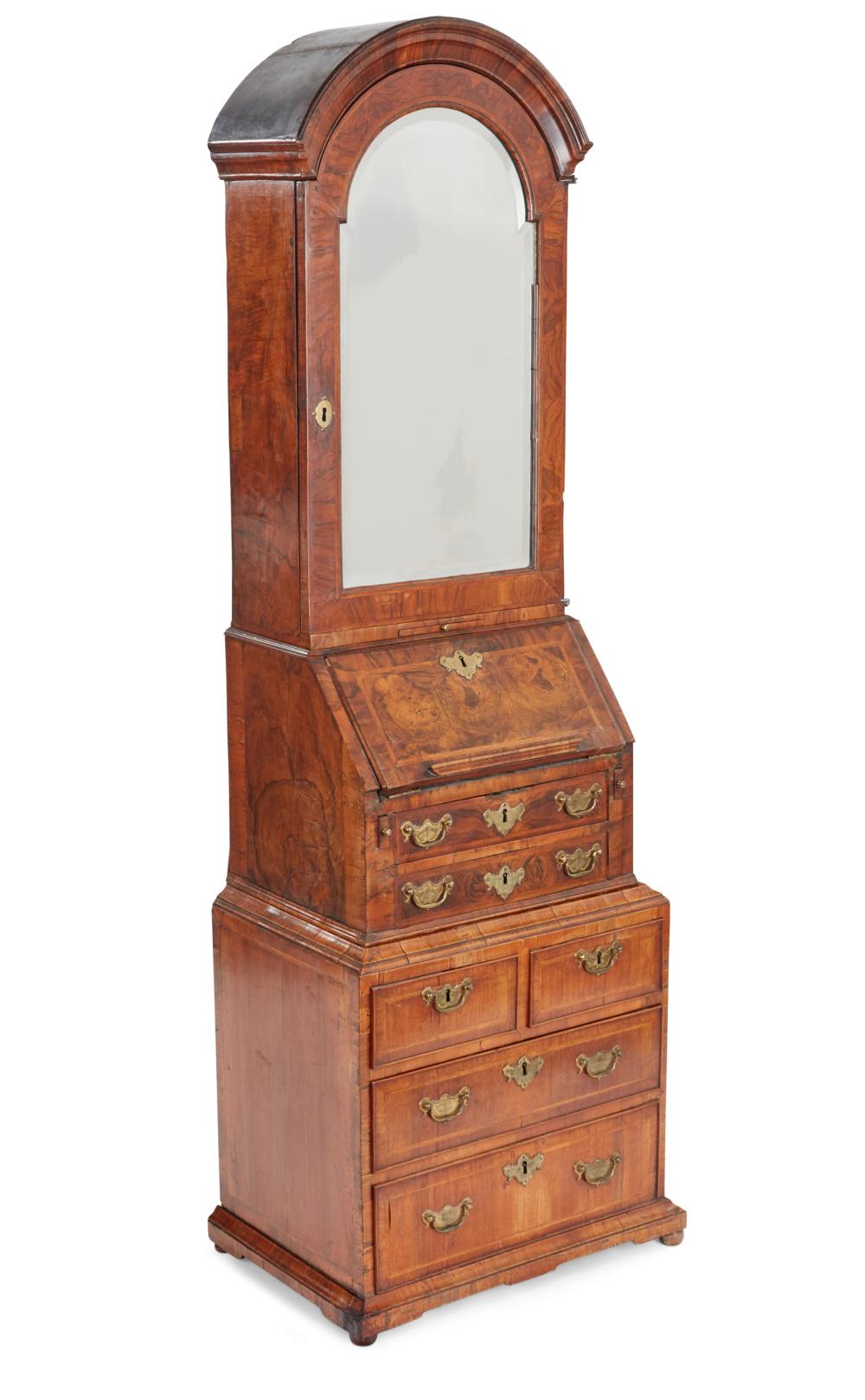 A diminutive Queen Anne walnut secretary cabinet, early 18th century, upper two sections and lower section associated