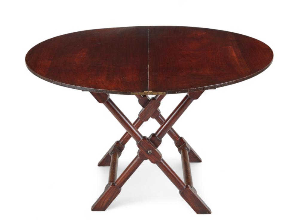 A George III walnut circular coaching table late 18th century
