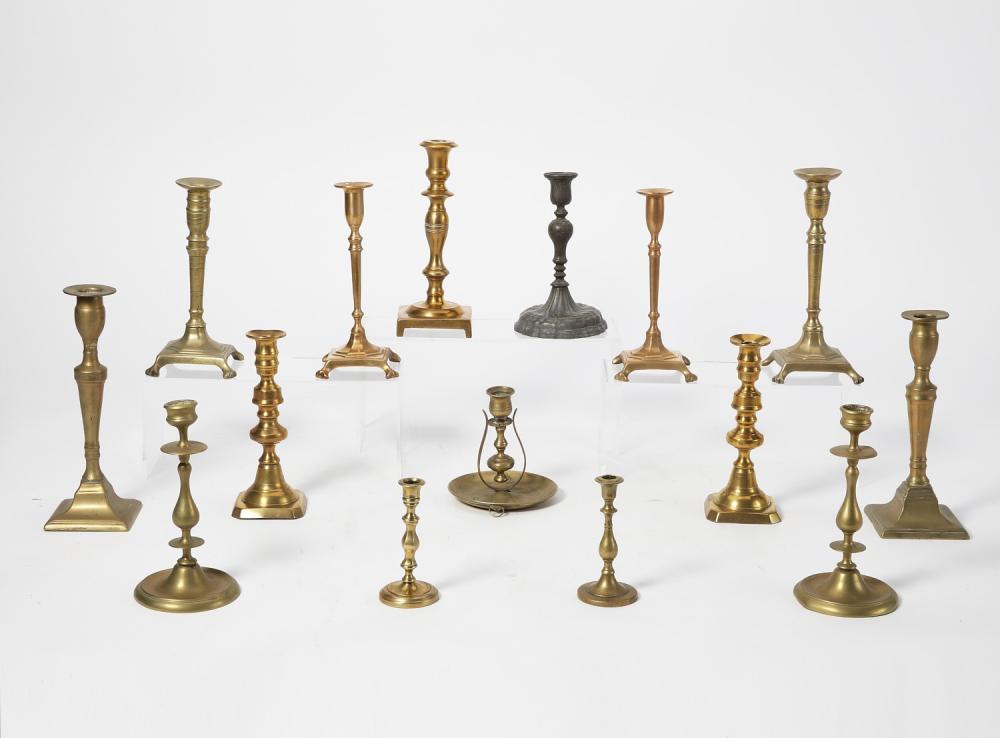 A group of fifteen metalware candlesticks, 18th/19th century