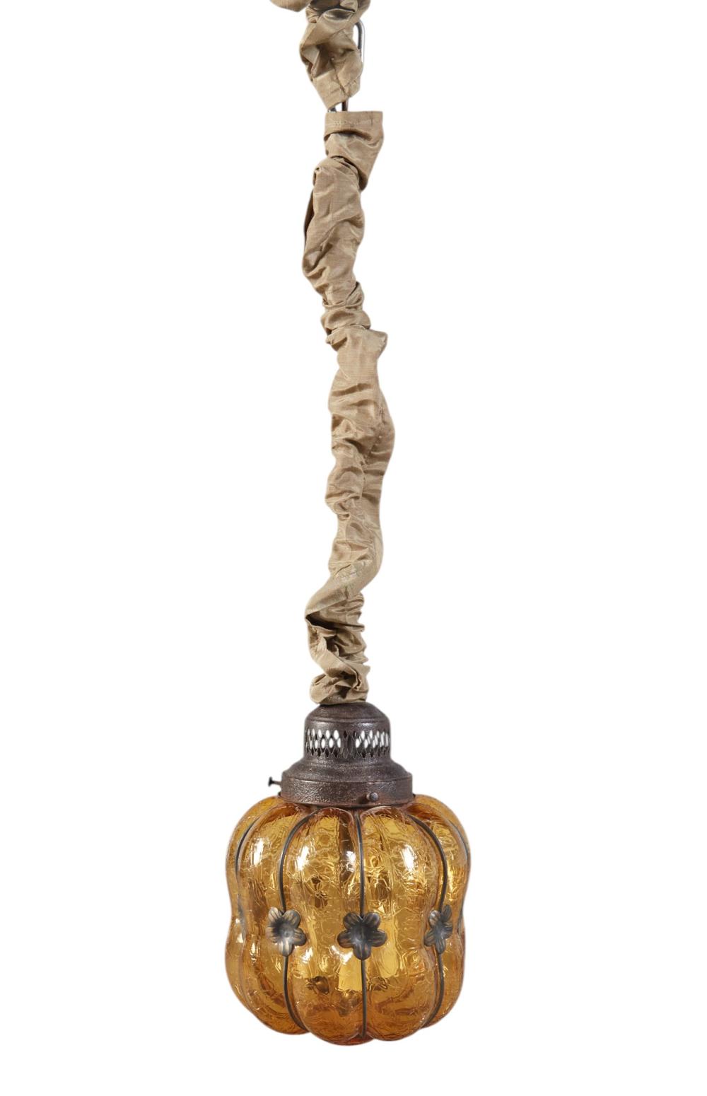 A pendent ceiling fixture