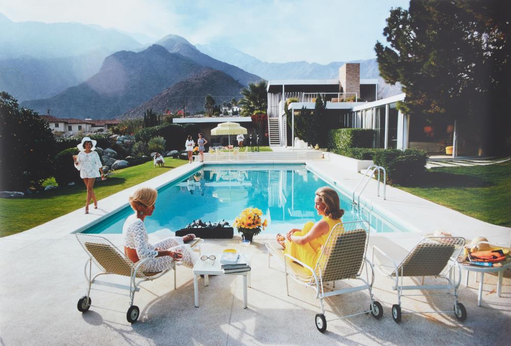 Slim Aarons (American, 1916-2006), Poolside Gossip, 1970, dye coupler print on archival paper, 30 x 40in (76 x 101cm)
