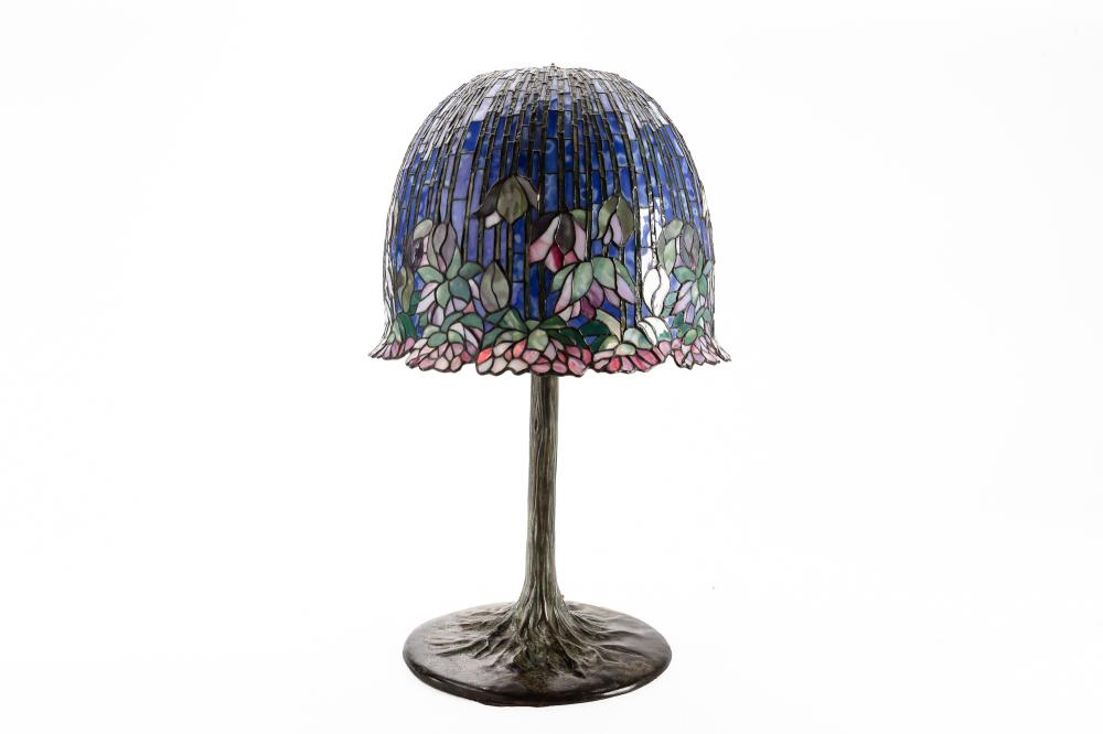 An American Arts & Crafts leaded glass and patinated bronze table lamp post 1950