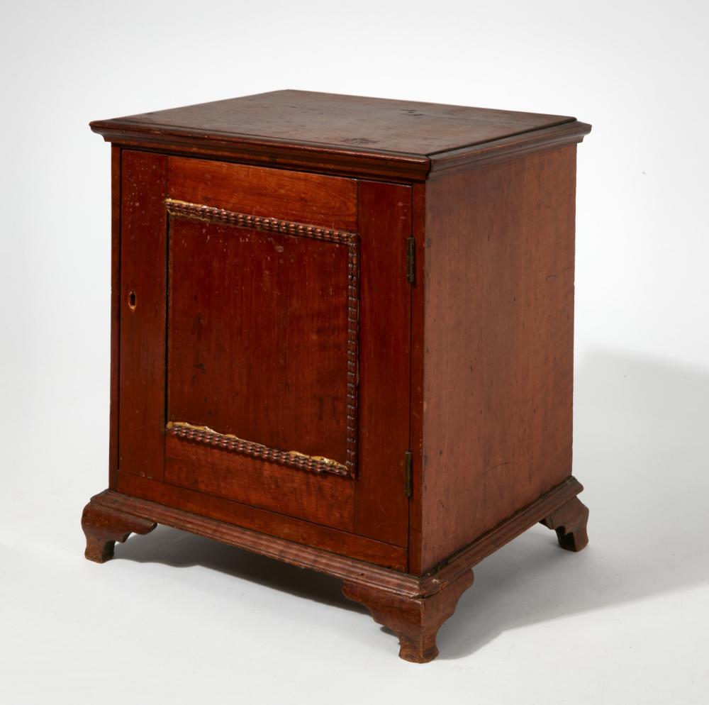 A Chippendale maple and walnut spice cabinet, Pennsylvania, late 18th century