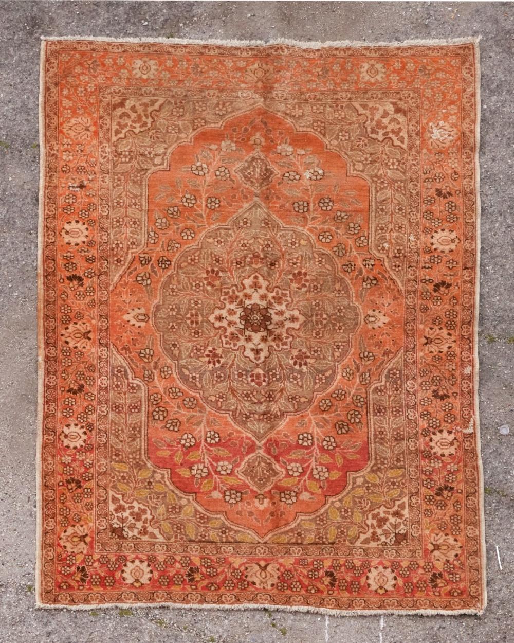 A Tabriz rug