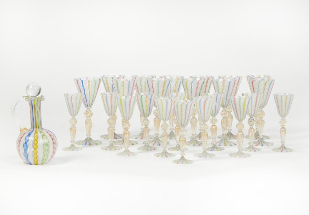 A twenty-five piece collection of Murano multicolored ribbon glass articles