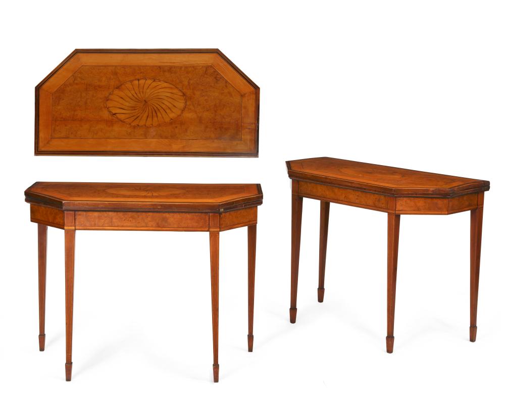 A pair of George III line inlaid satinwood, burr elm, mahogany, amaranth, harewood and marquetry card tables, probably Irish, circa 1790