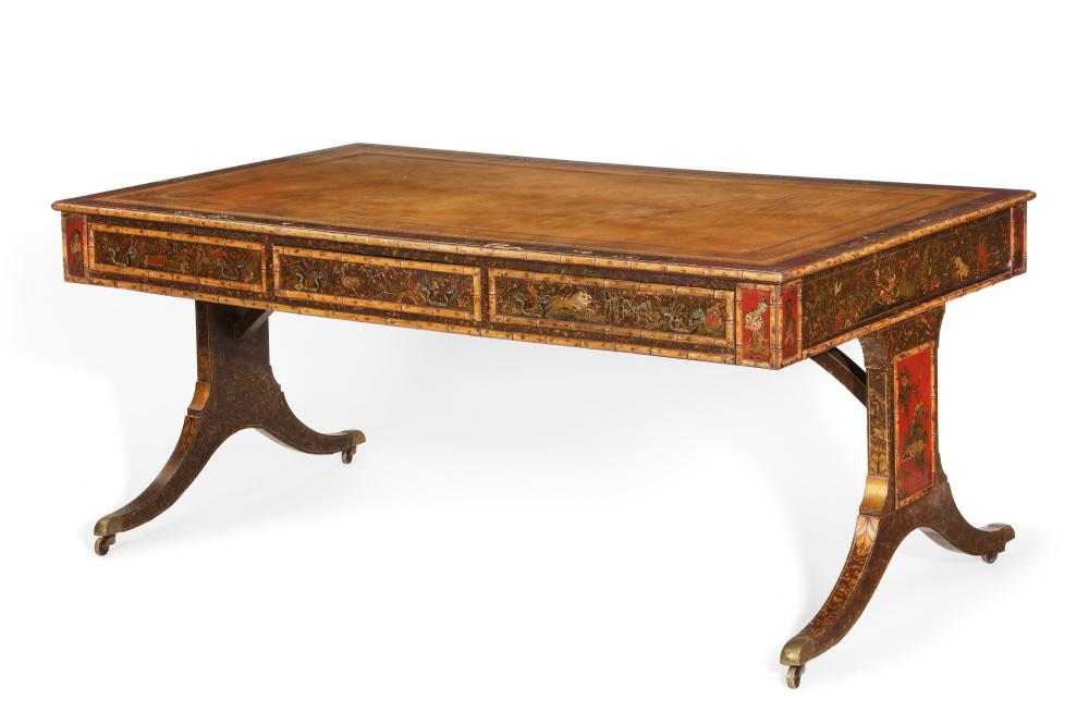 An English chinoiserie decorated, grain painted and faux bamboo partner’s writing table, second half 19th century
