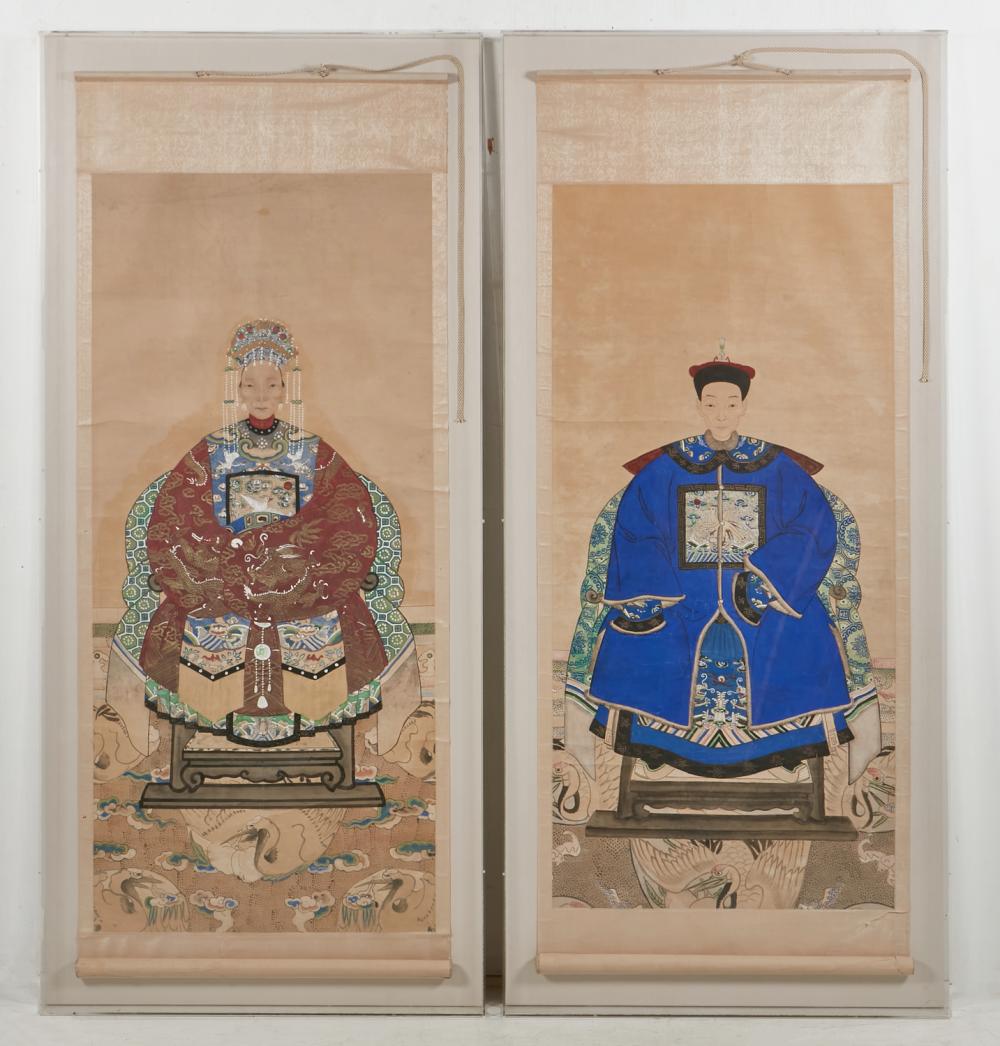 A pair of framed Chinese ancestral portrait scroll paintings on paper