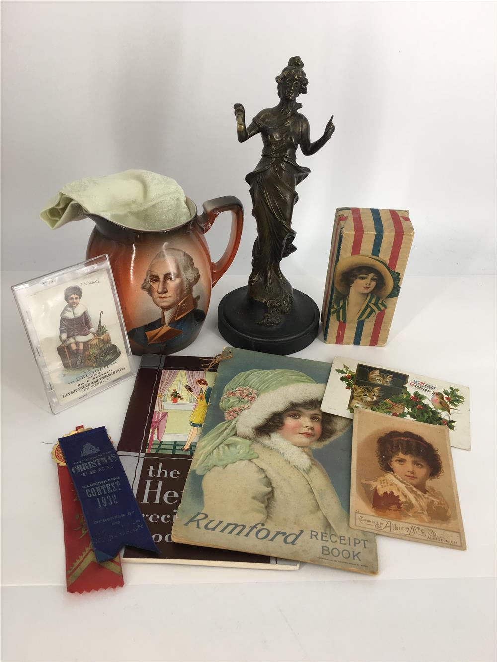 BOX LOT INCLUDING A 6" GEORGE WASHINGTON PITCHER, BRASS STATUE, AND VINTAGE EPHEMERA.