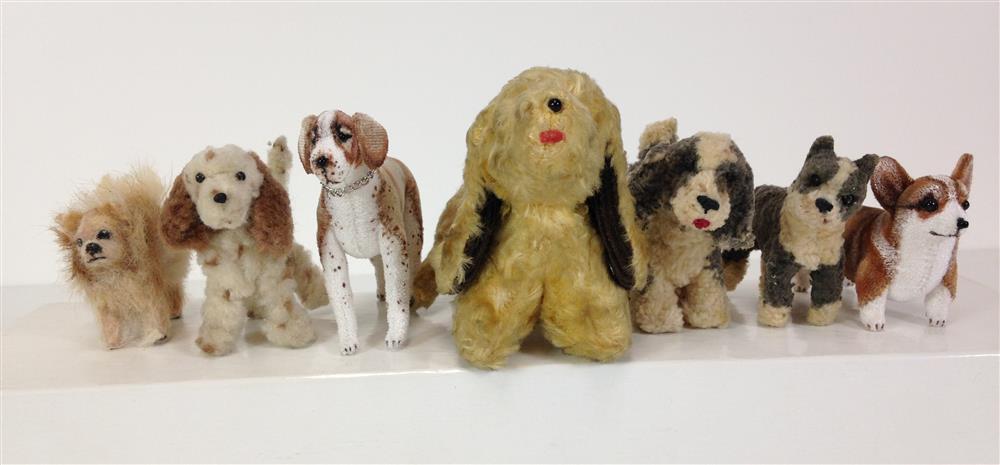 LOT (7) MINIATURE DOGS. 2" - 4 1/4" LONG, THREE ARE MADE OF PIPE CLEANERS, TWO ARE NEWER ARTIST MADE, SMALLED (POMERANIAN) IS PARTIA...