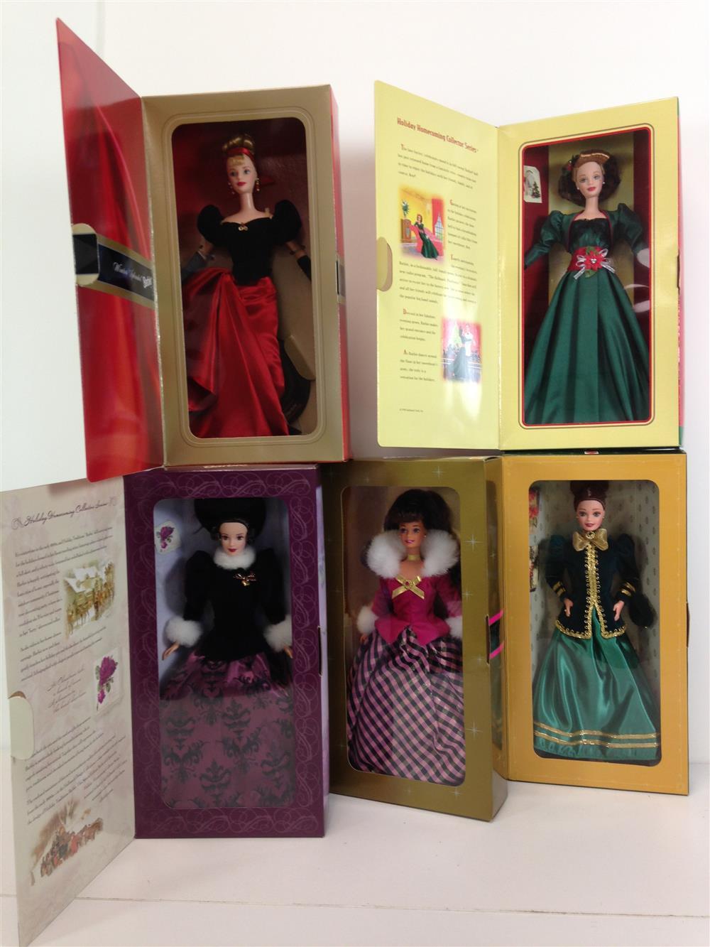 (5) NRFB BARBIES INCLUDING "YULETIDE ROMANCE", "HOLIDAY SENSATION", "WINTER RHAPSODY", "HOLIDAY TRADITIONS" AND "WINTER SPLENDOR".