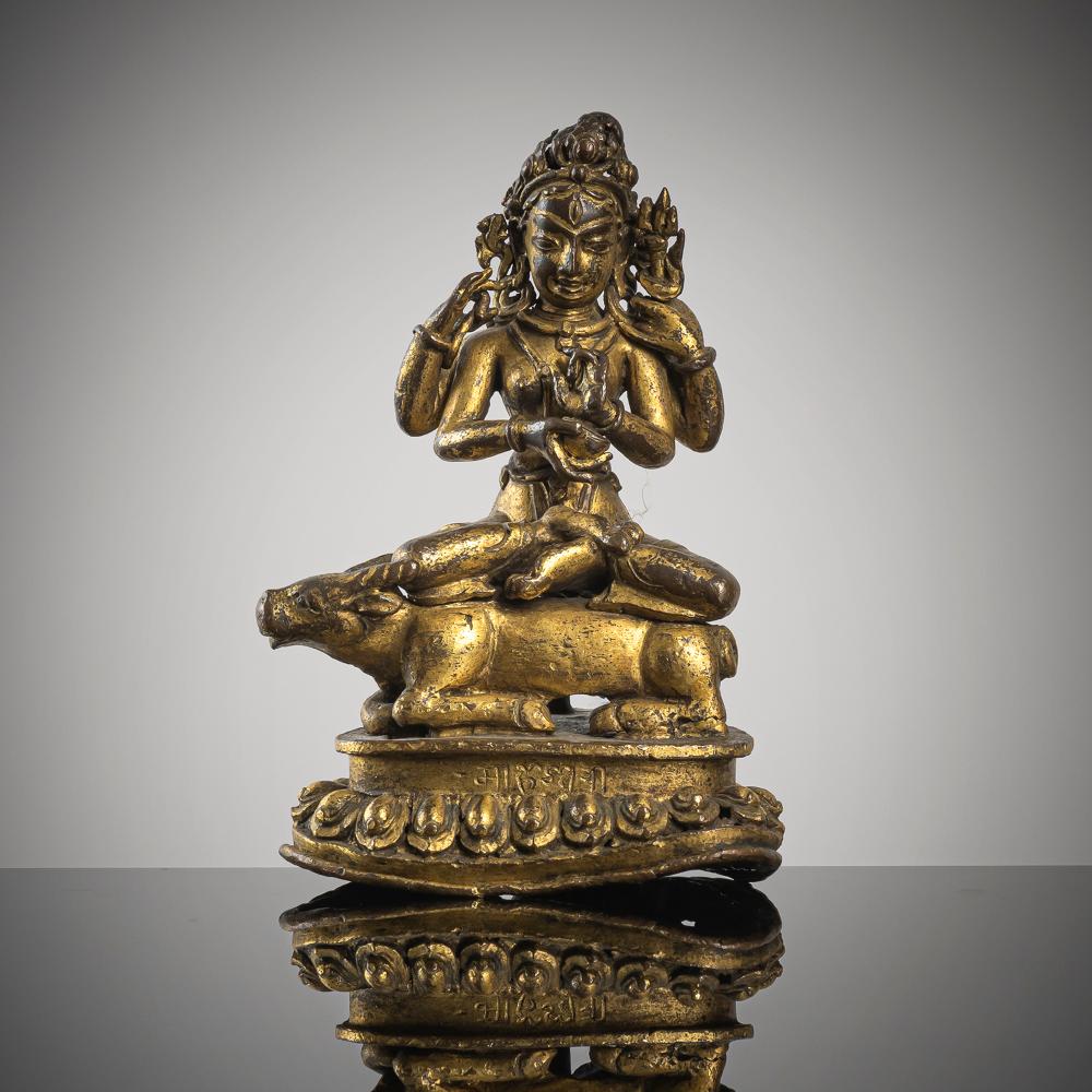 A gilt-copper figure by Maheshvari