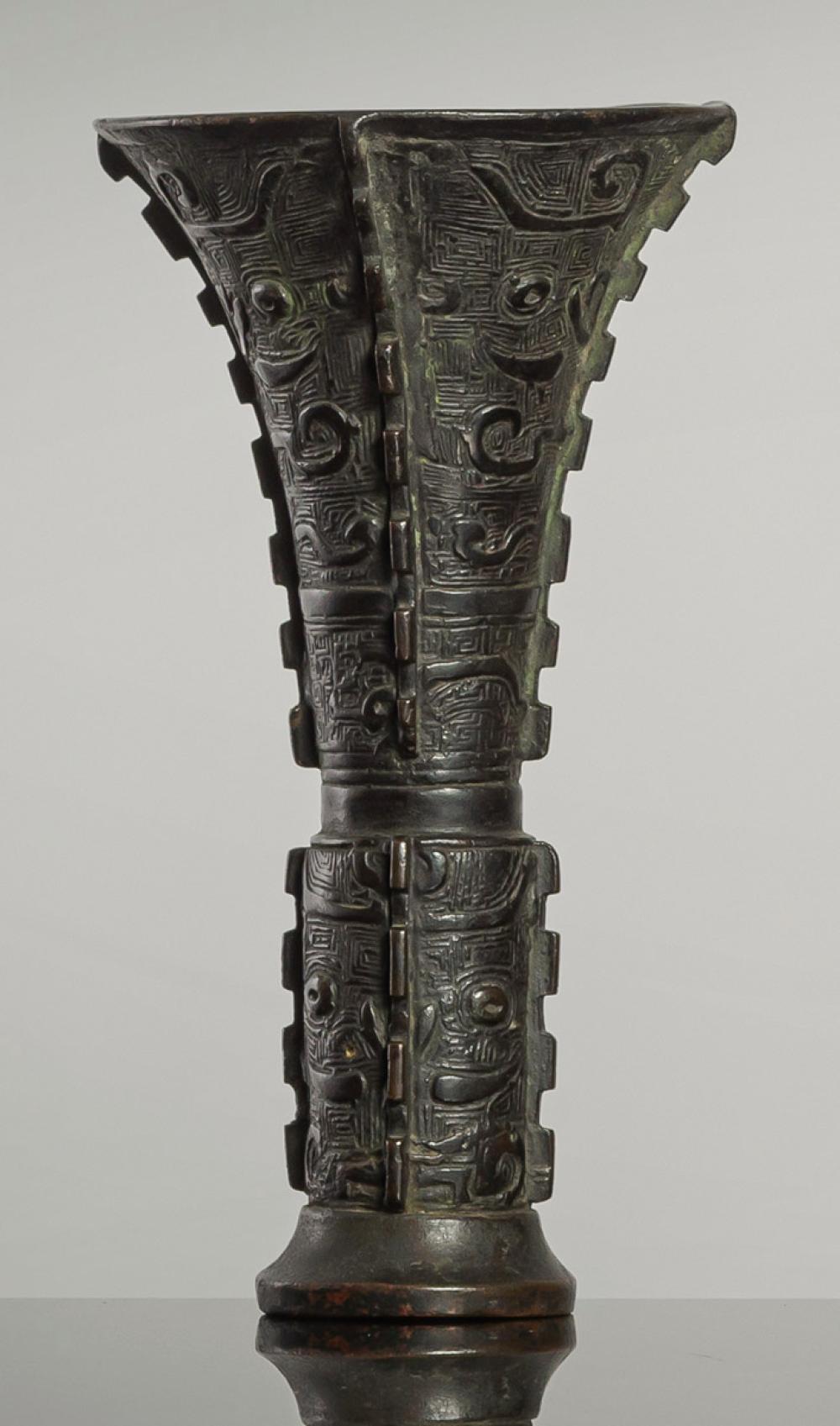 A GU-SHAPED BRONZE VASE IN ARCHAIC STYLE