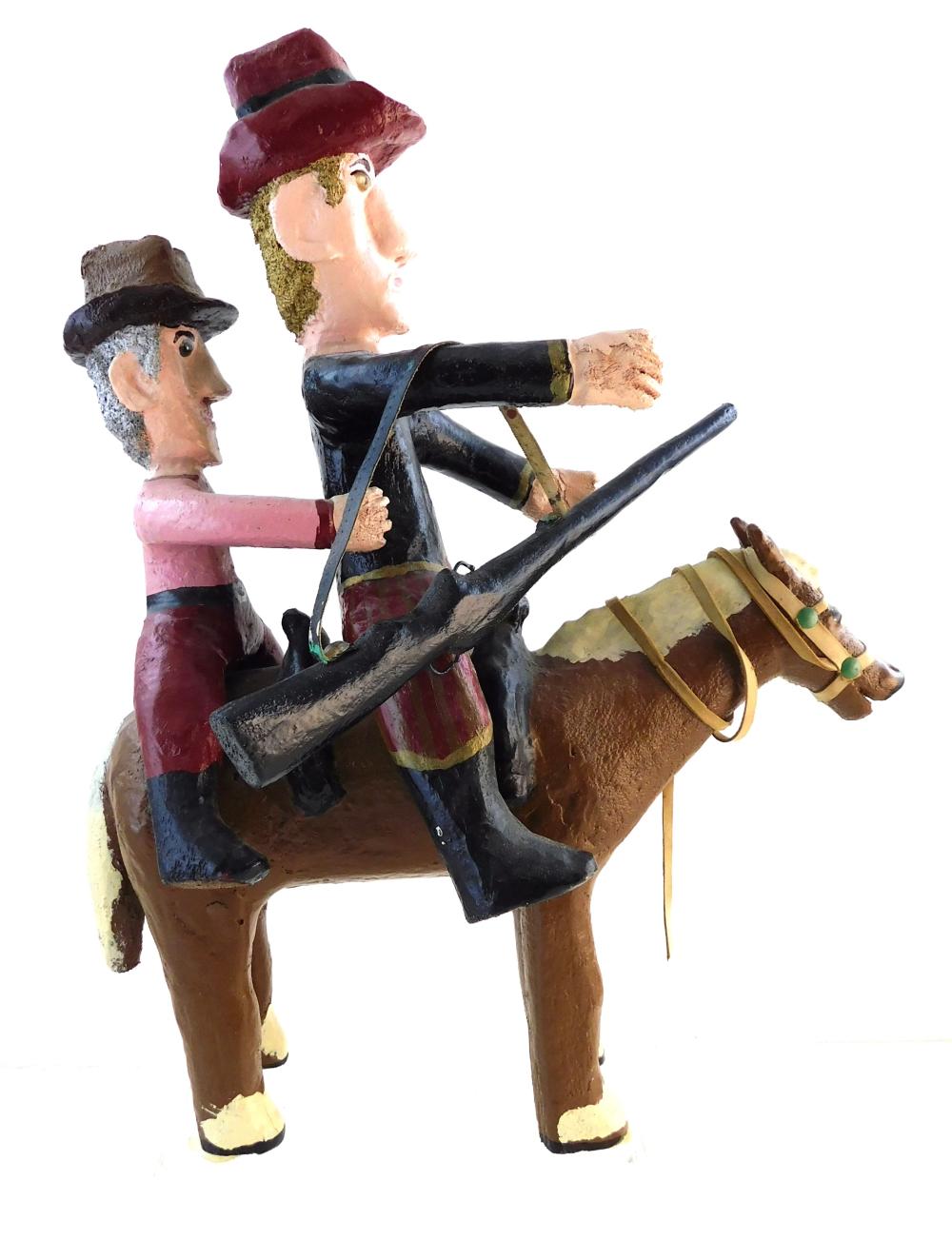 John Vivolo (American, 1886-1987), polychrome sculpture, carved and painted wood with mixed media elements, depicts two men in cowbo...