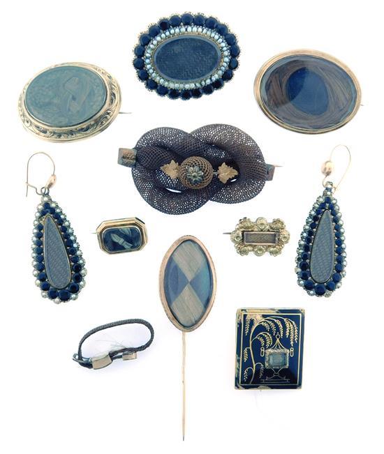 JEWELRY: Collection of 19th C. mourning jewelery with 14K and 10K, ten pieces including eight pins, one buckle, and one pair of earr...