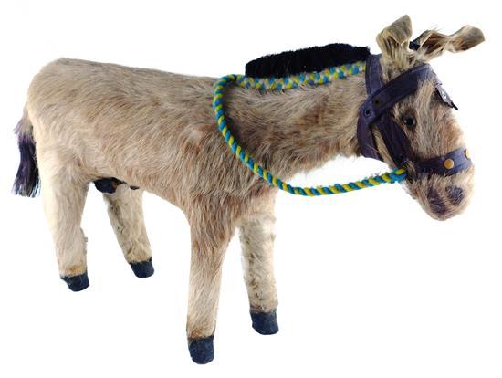 Childrens donkey with animal hair coat and ears, straw mane, leather bridle, yellow glass eyes, rope bridal, papier mache hoofs, som...