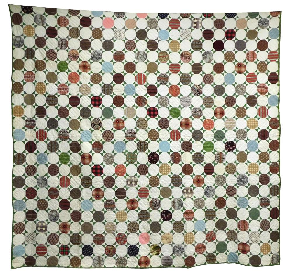 TEXTILE: Pieced quilt, c. 1850, primarily cotton calicoes, but also including a number of wool prints (delaines), the pattern is "Sn...