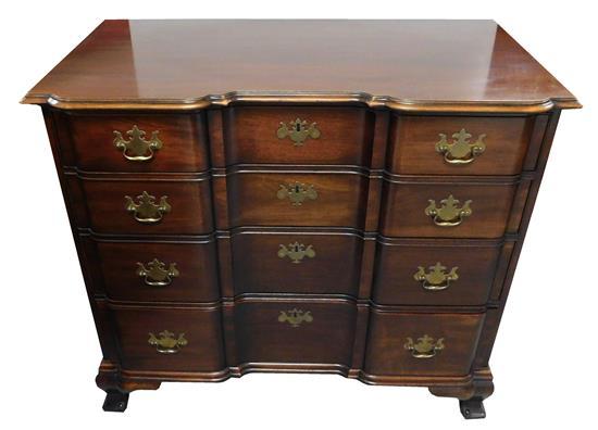 20th C. Chippendale style mahogany block front chest, four drawers of graduated size, batwing escutcheons, ogee bracket base, Waysid...