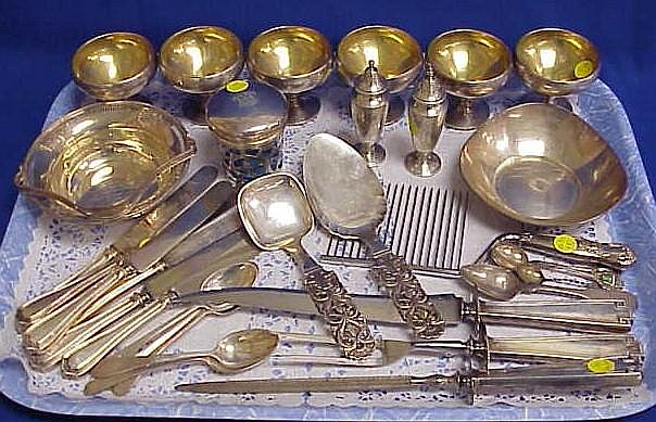 Sterling hollowware and fla... image
