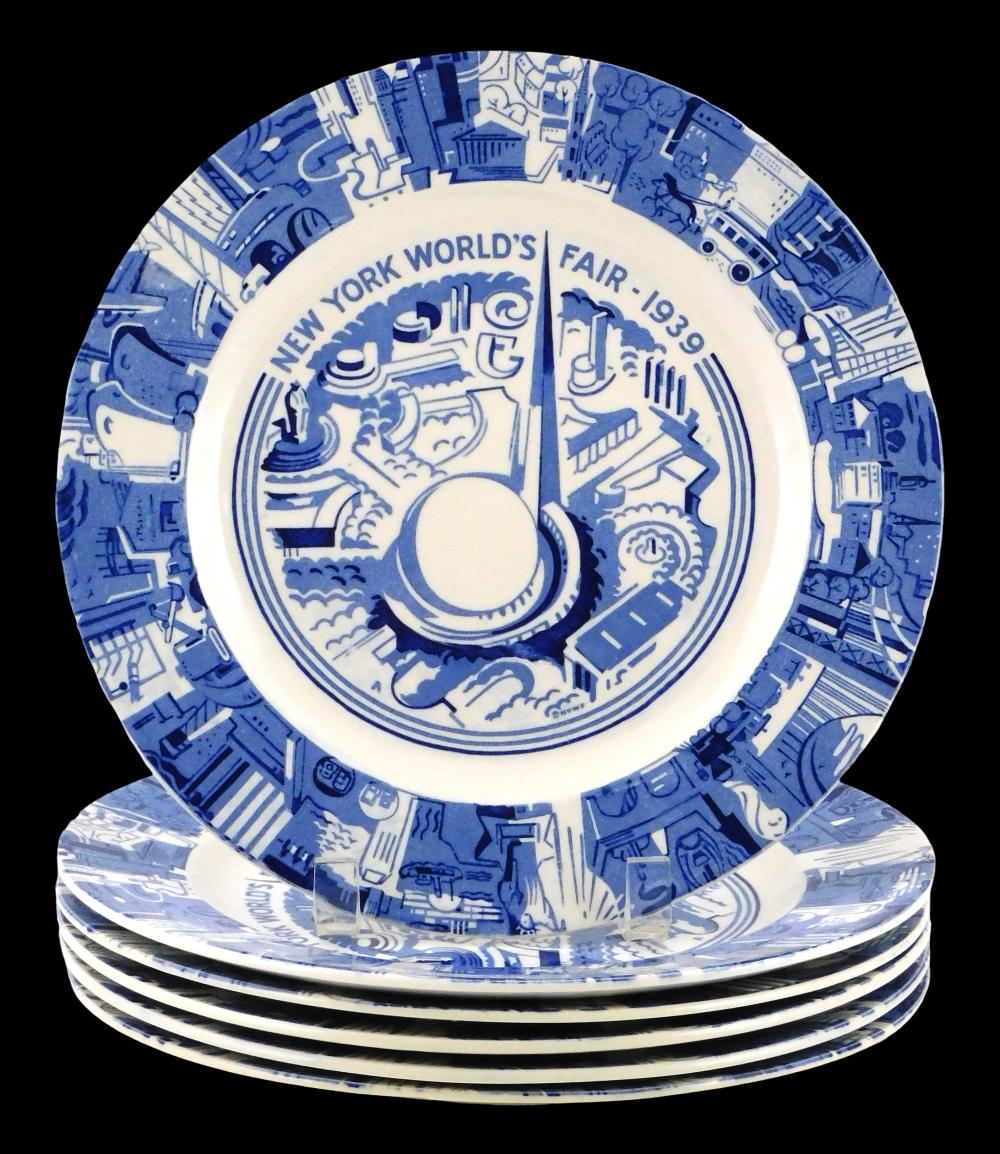 Six 1939 World's Fair blue and white transferware plates, made by Adams, England, retailed by Tiffany & Co., blue and white cityscape collage to rim, Trylon and Perisphere design at center, stamped on reverse with mak...