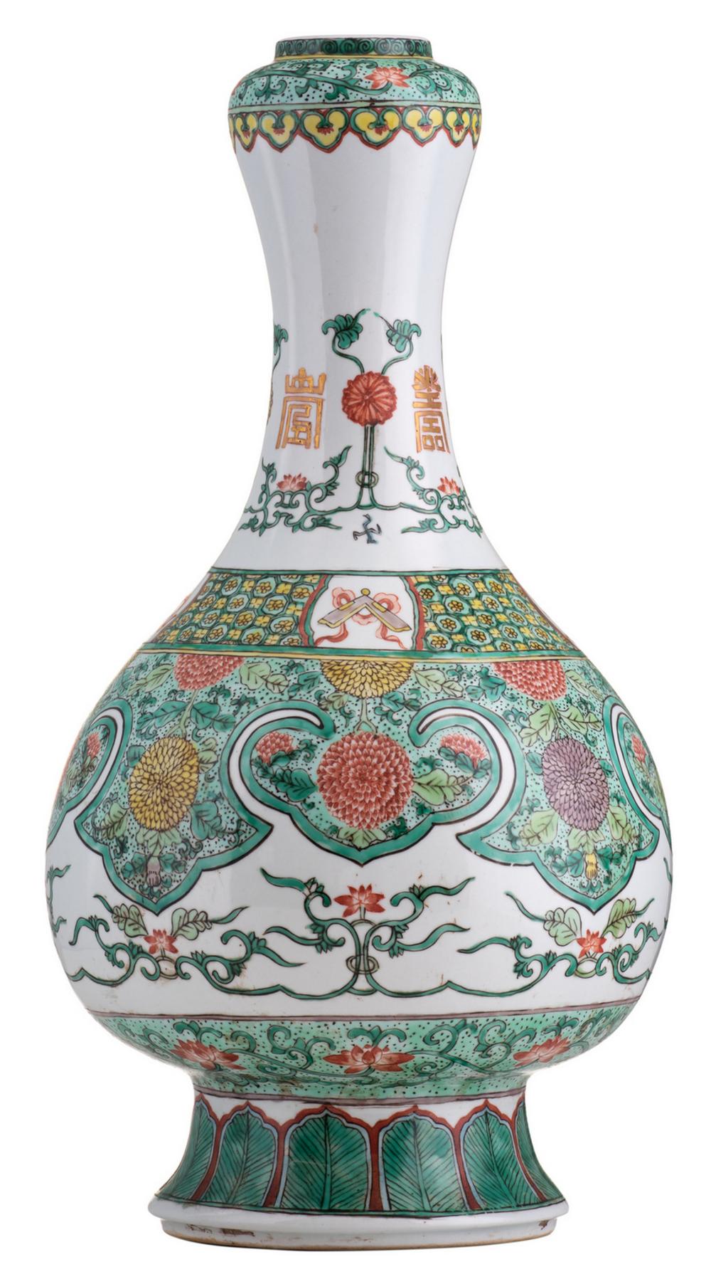 A 19thC European copy of a famille verte garlic vase, floral decorated with Shou signs and Buddhist symbols, at the bottom an apocryphal symbol mark, H 42 cm