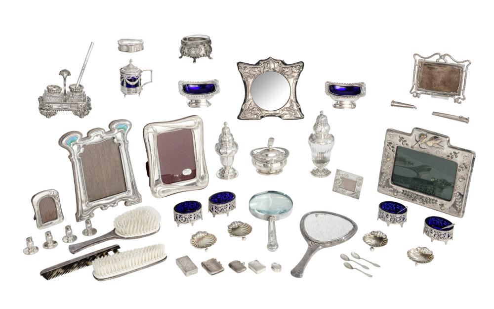A pair of Louis XIV style pewter covered bronze bracket lights, H 50,5 cm; added a pair of silver-plated neo-baroque andirons, H 65 cm, extra added: three table lamps made out of silver plated candle sticks, H 66 cm; a ditto lamp made out of  a mid 1