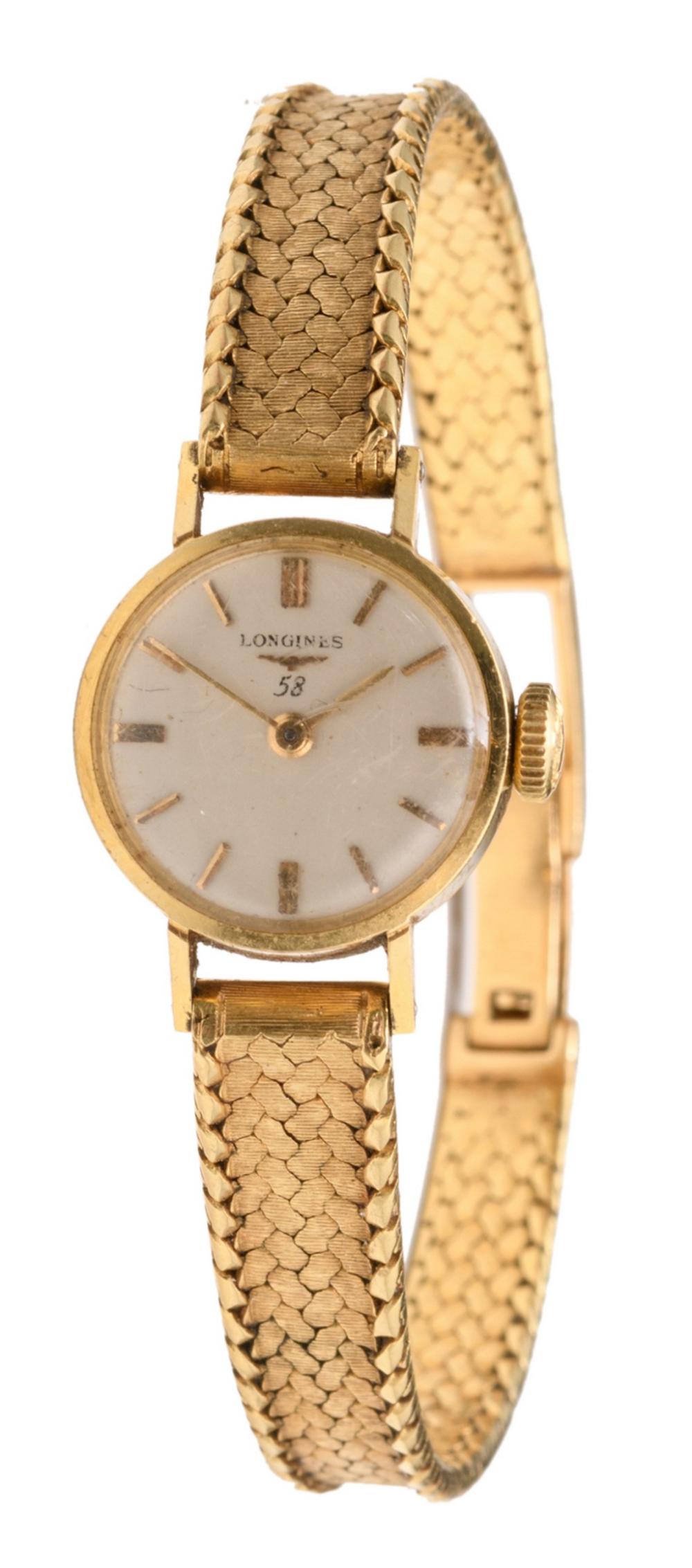 An 18ct ladies gold wristwatch, Longines 58, total length 18,3 cm - total weight (glass incl. - movement and dial excl.) 25 g