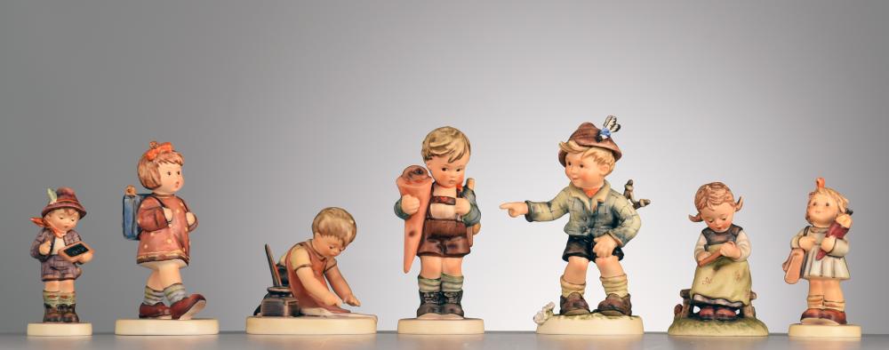 A collection of Hummel figurines at school
