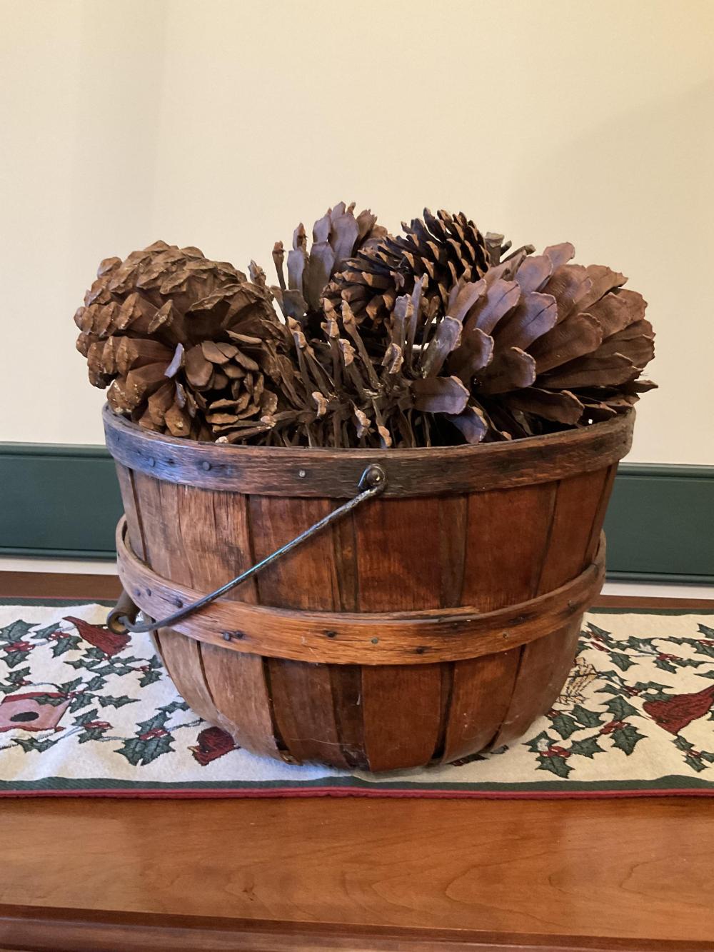 Wooden Basket with Pinecones