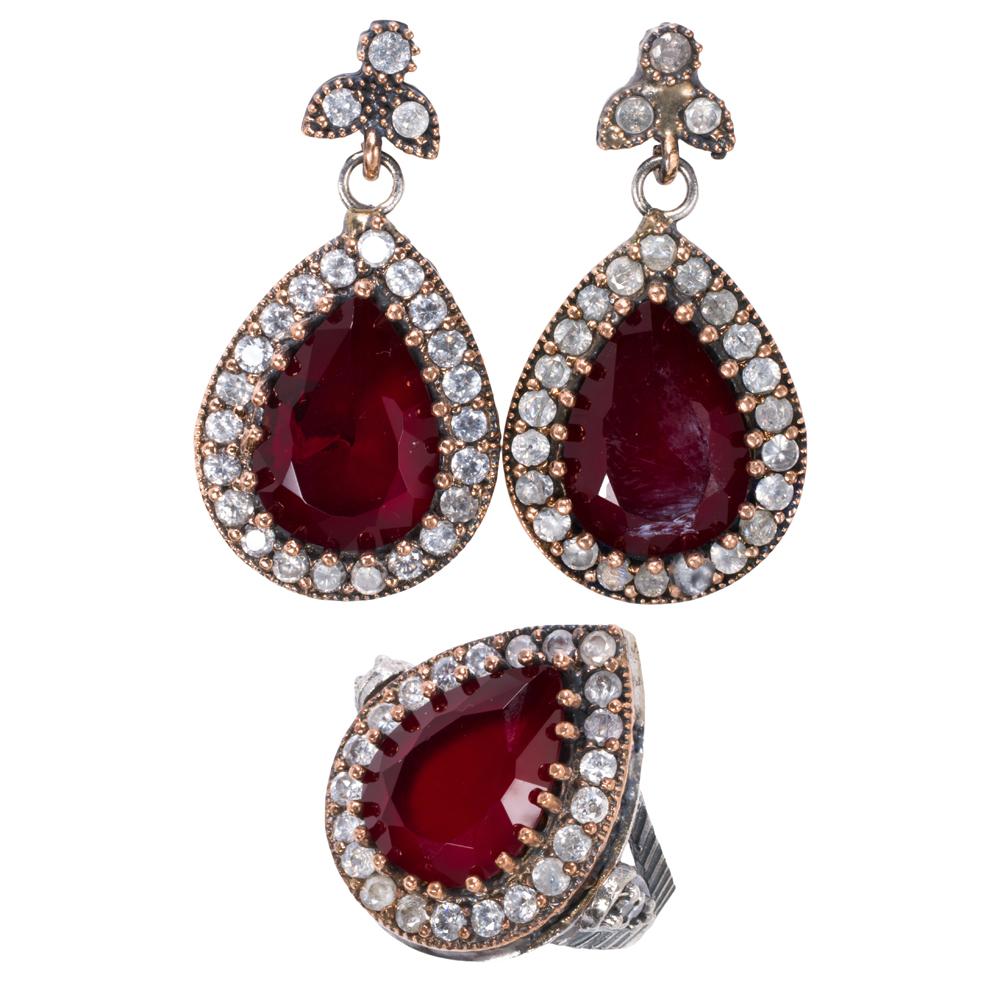 A synthetic gem and silver ... image