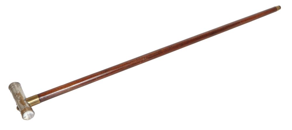 Unusual Flashlight Handled Mahogany Walking Stick, 20th c., H.- 33 1/8 in., W.- 4 5/8 in., D.- 1 in.