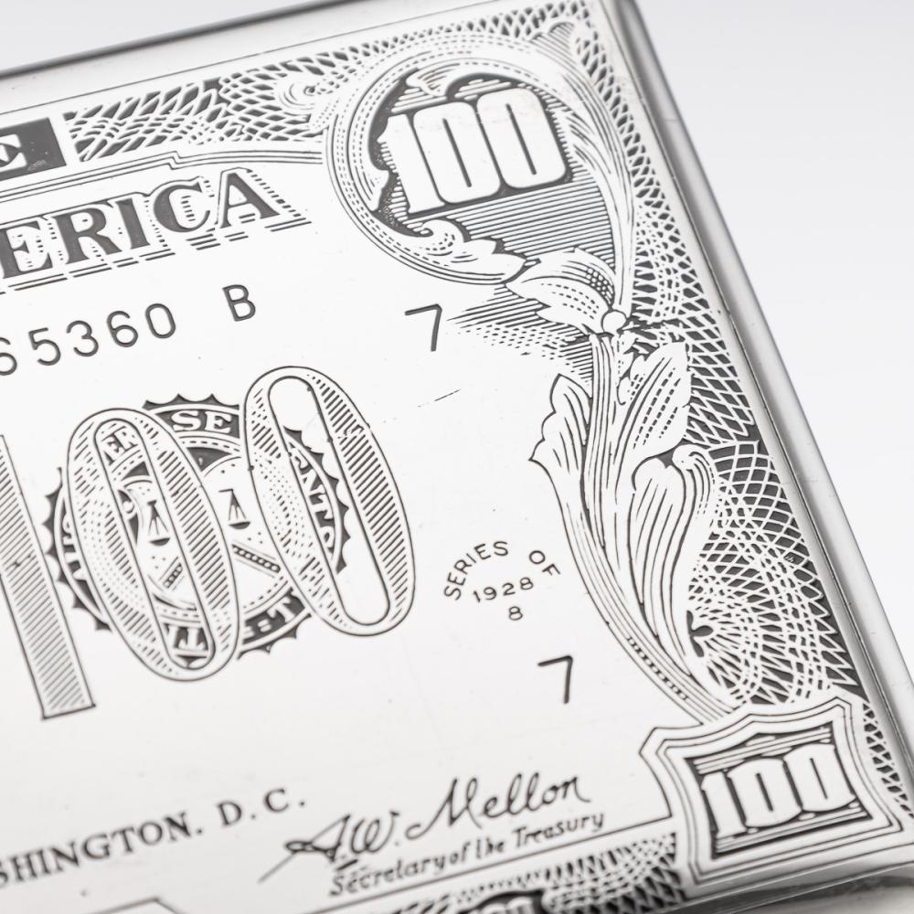 Sold at Auction: AN AMERICAN SILVER PLATED CIGARETTE CASE AND LIGHTER  SHAPED AS A HUNDRED DOLLAR BILL