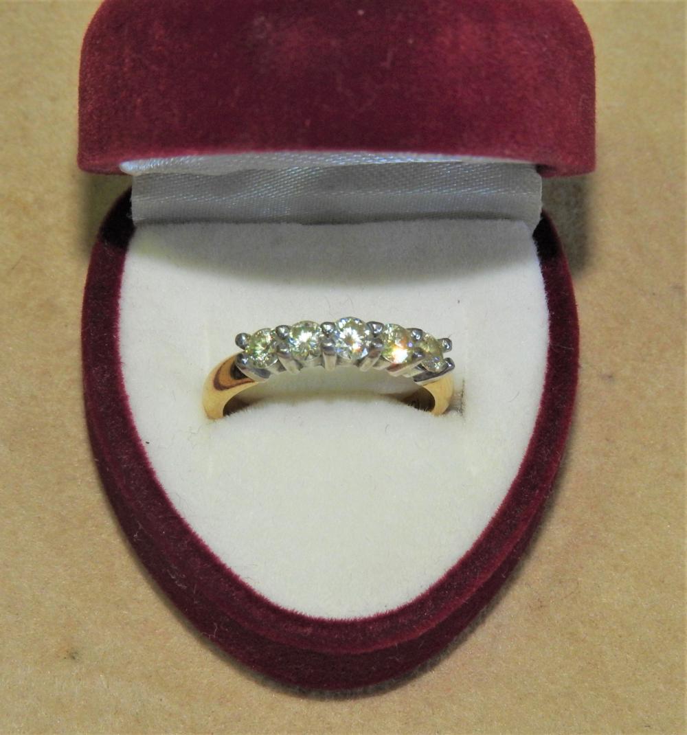 18ct gold Claw Set five diamond Ring