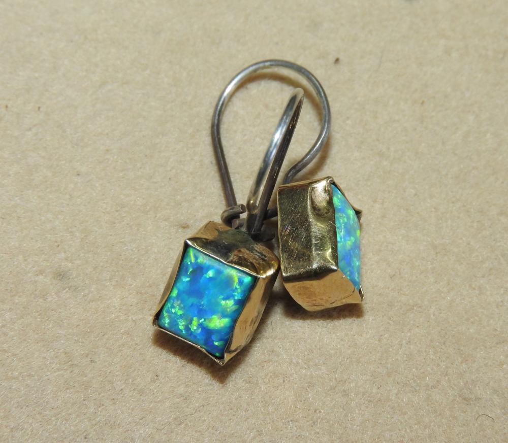 A Pair of Doublet Opals set in Box frame Setting