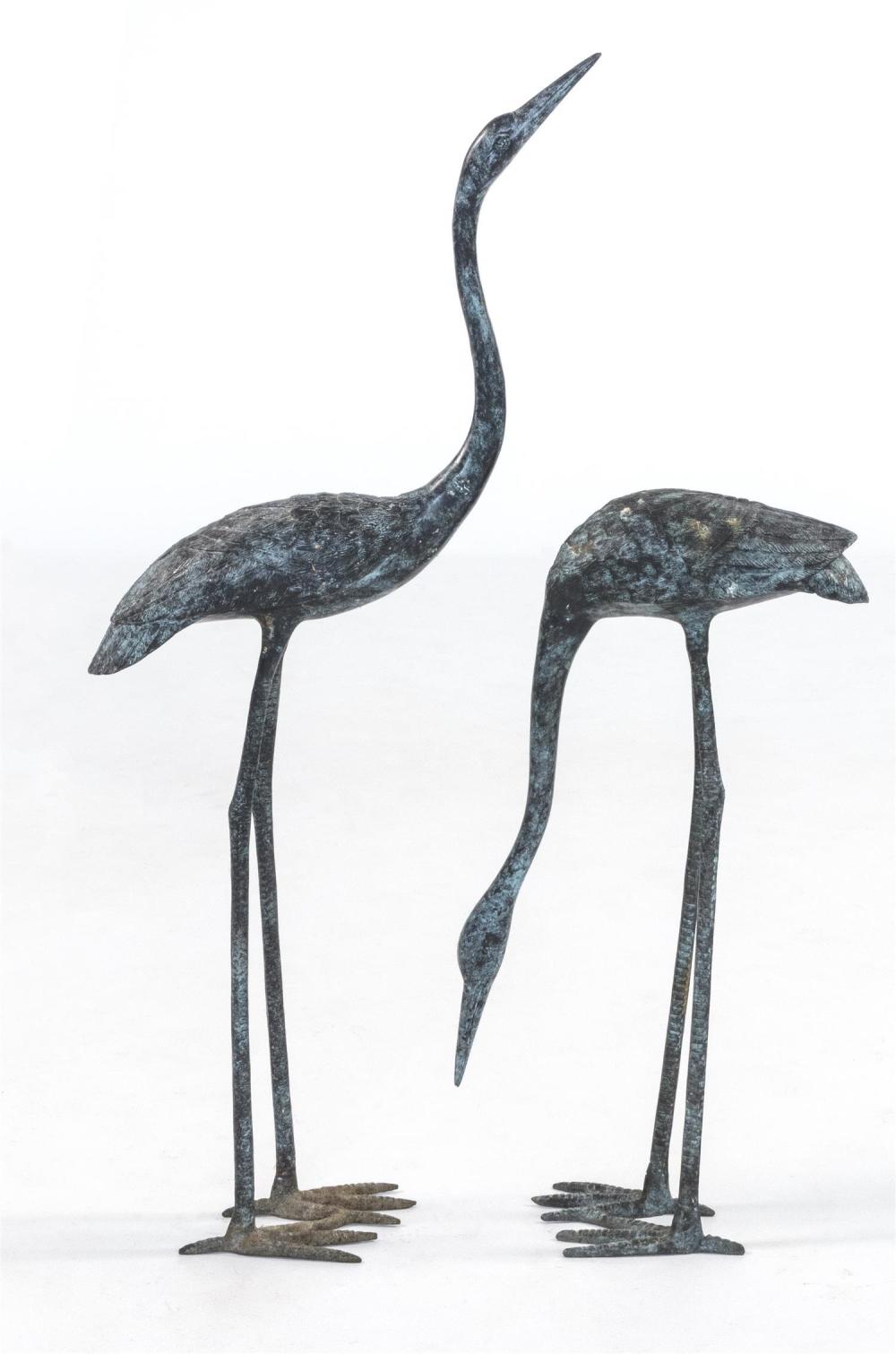 PAIR OF JAPANESE BRONZE GARDEN CRANES One in feeding position and the other in full upright position. Height of upright crane 33.5".
