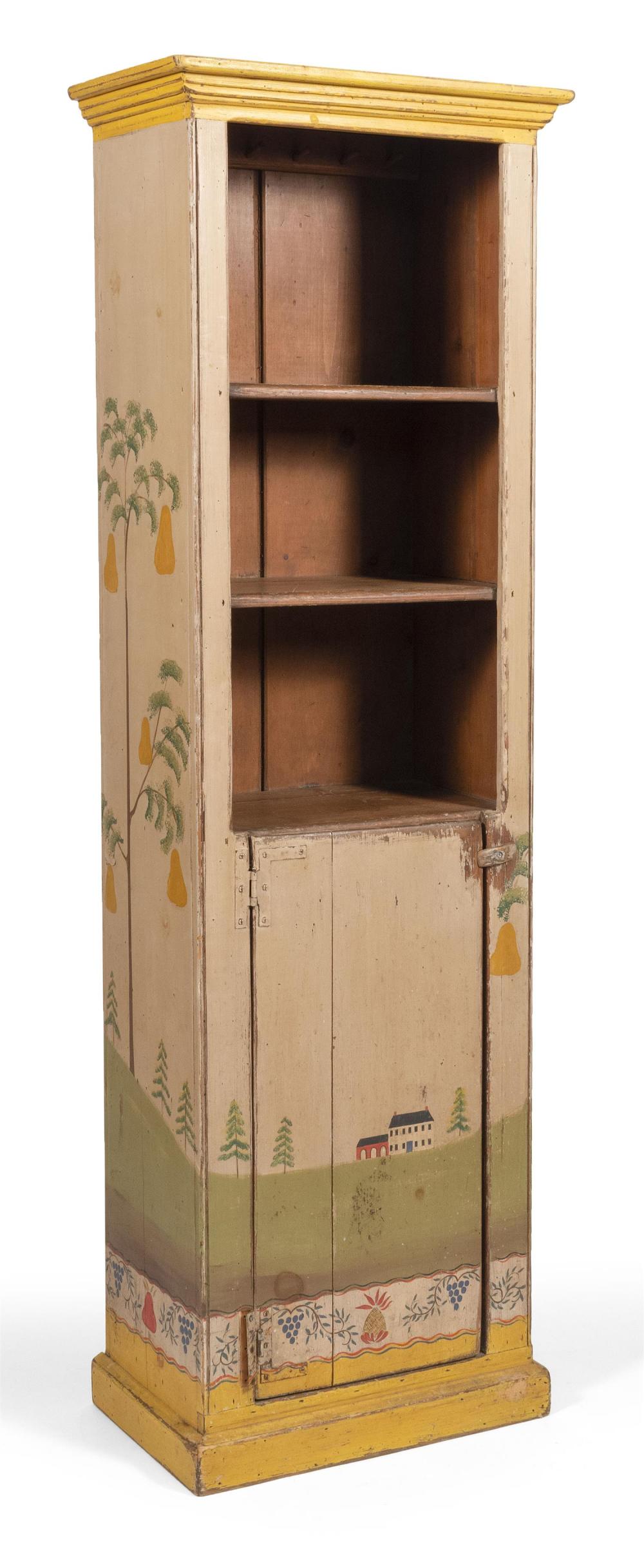 DECORATIVELY PAINTED PINE CUPBOARD BY PHIPPS & WYNNE With shaped cornice, two interior shelves and a single door. Painted decoration...
