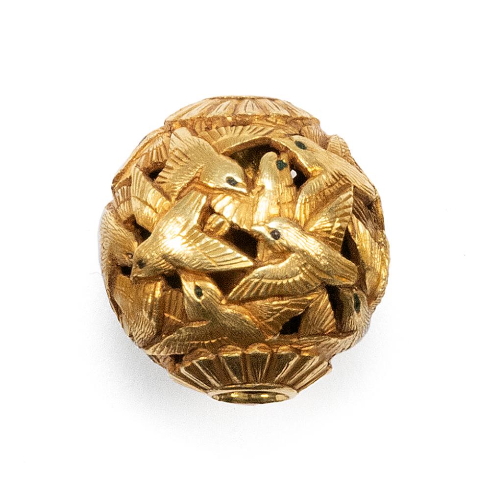 GOLD OJIME In ball form depicting an openwork flock of sparrows flying in various directions. Diameter .65".
